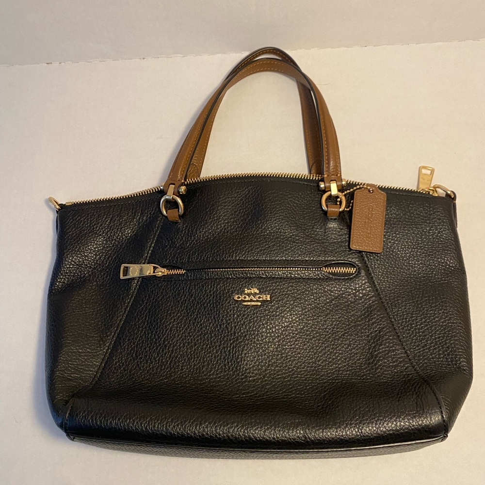 Coach black leather satchel handbag. Like new condition. Original owner.